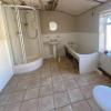 A háztulajdonos megosztja olcsó fürdőszobai átalakítása titkát