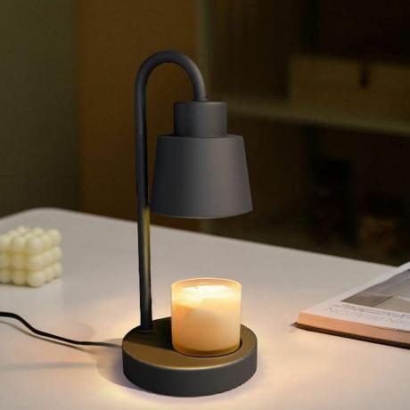 lámpara calentadora de velas negra con vela